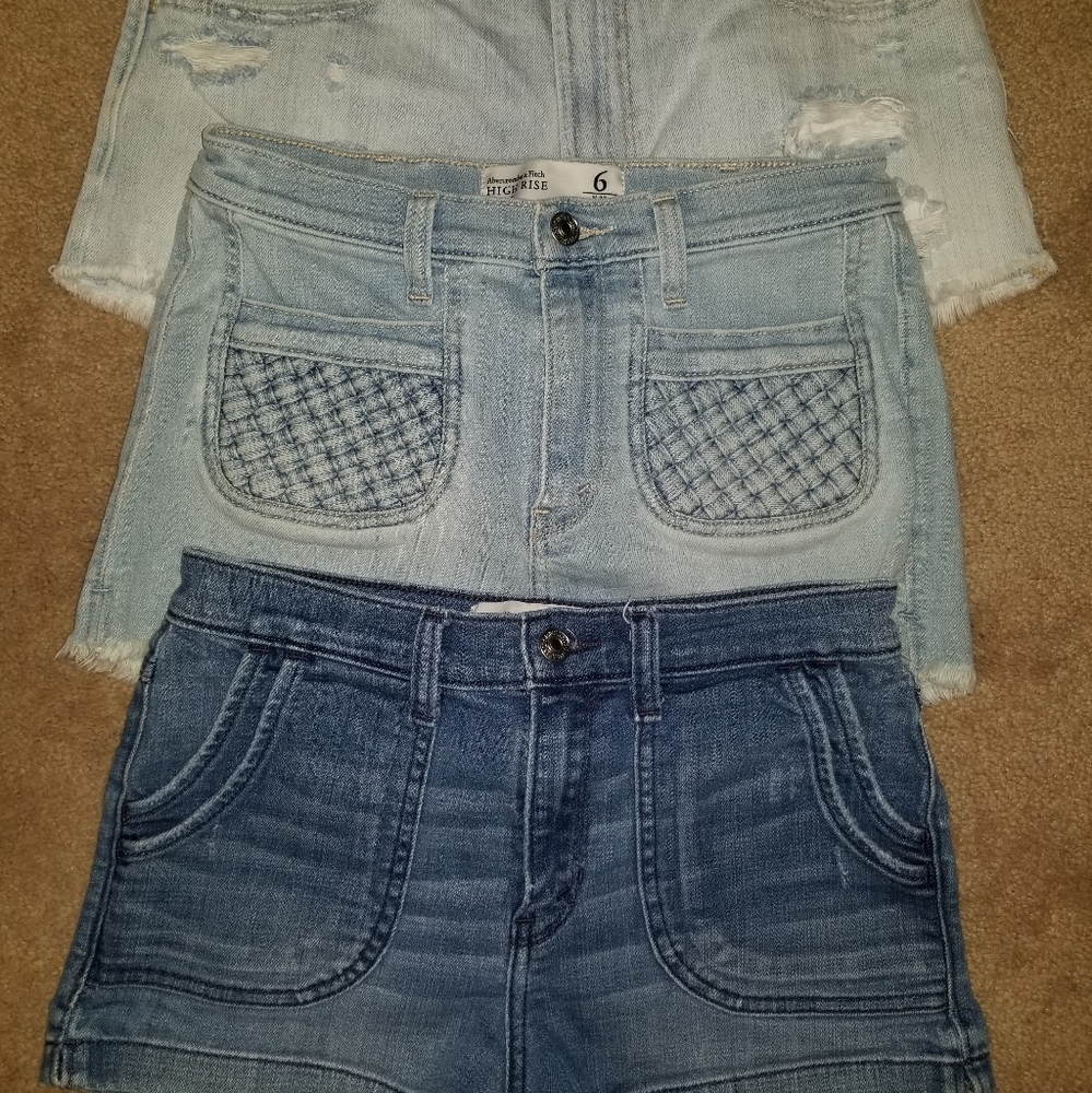 3 pairs of high rise jean shorts.